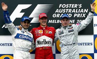 Michael Schumacher (1), ladeado por Juan Pablo Montoya (2) e Kimi Raikkonen (3)